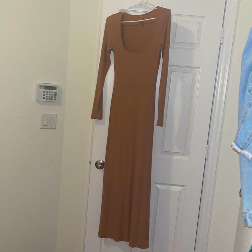 Skims dress in tan